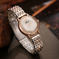 Exquisite Round Dial Quartz Watch with Roman Numerals